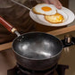 Wok en fonte martelée fait à la main avec couvercl