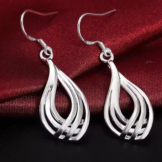 Boucles d'oreilles minimales géométriques à trois anneaux