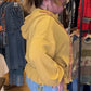 Veste Chic à Capuche et Fermeture Éclair avec Ourlet à Volants