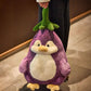 Adorable pingouin aubergine en peluche ultra-douc