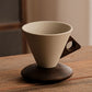 Tasse à café vintage avec anse en bois et soucoupe