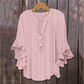 Blouse élégante à col en V et manches à volant