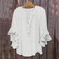 Blouse élégante à col en V et manches à volant