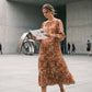 Robe midi élégante à motif floral et col en V pour femme