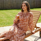 Robe midi élégante à motif floral et col en V pour femme