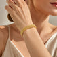 Bracelet plaqué or 14 carats, en mailles larges tissées